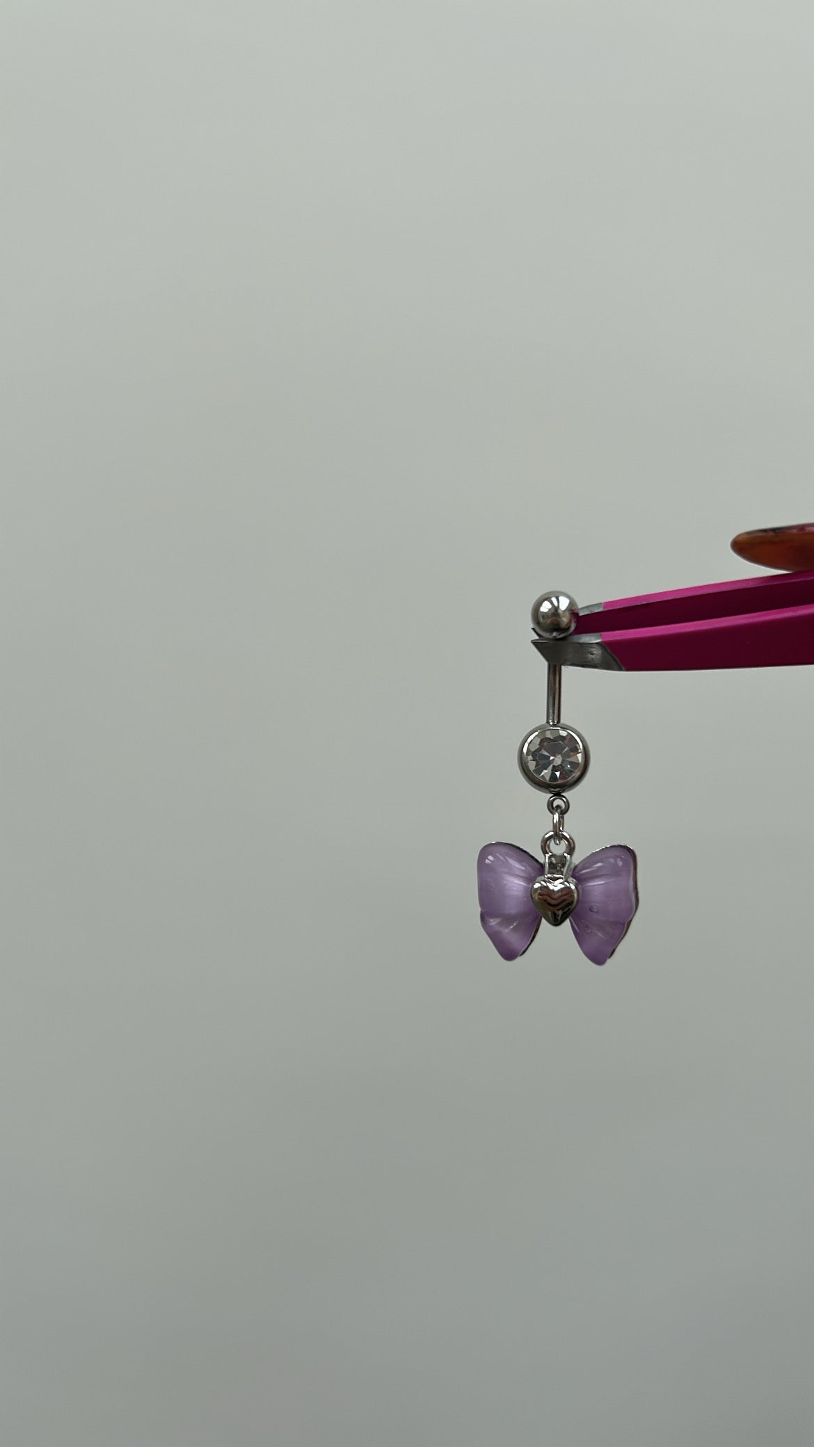 Purple bow pendant silver belly bar