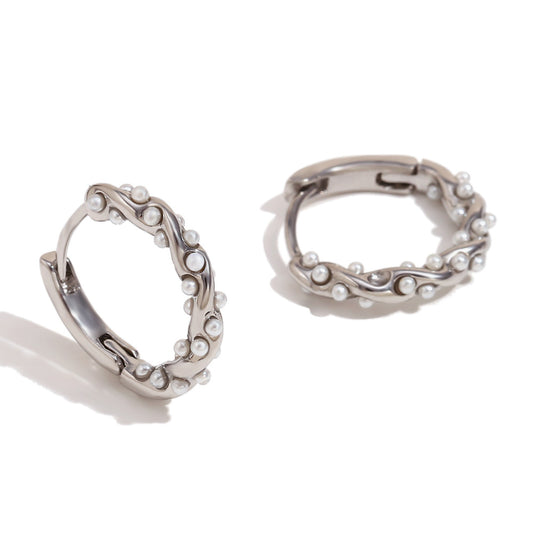 Twisted pearl hoop earrings in silver